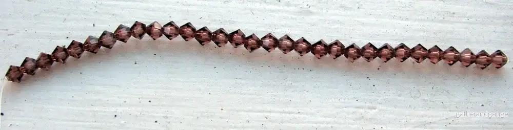 Tjeckiska MC Bicone - Light Burgundy 4 mm, 1 sträng - Bild 2