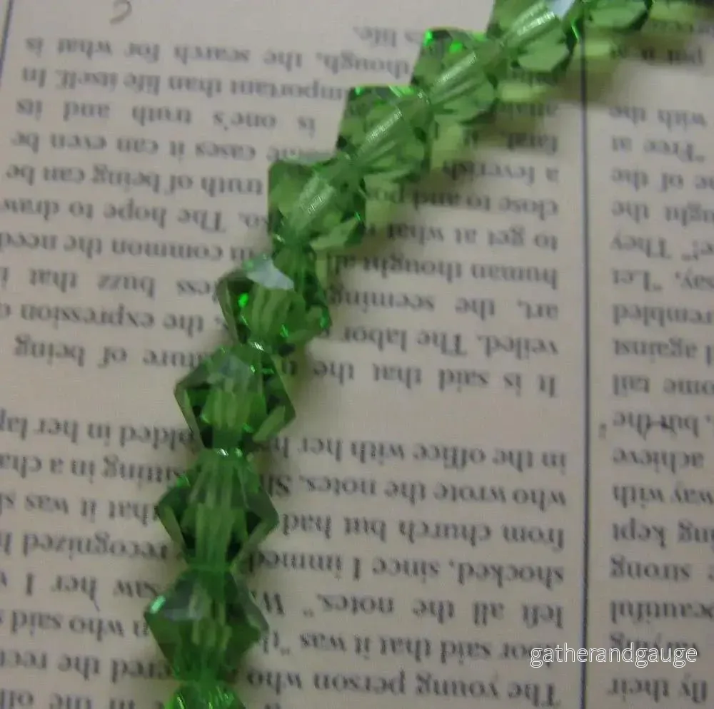 Tjeckiska MC Bicone - Peridot 6 mm, 1 sträng