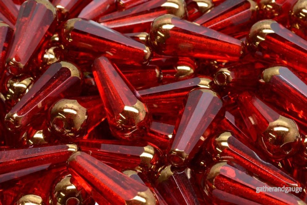 Firepolish Drop Bead – Siam With Bronze 20 x 9 mm, 1 styck Firepolish Drop Bead – Siam With Bronze 20 x 9 mm, 1 styck