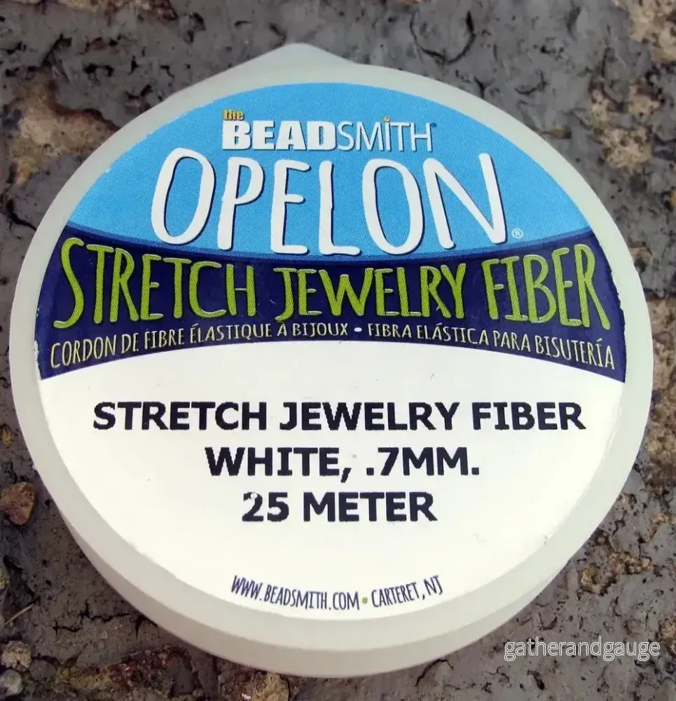 Opelon Elastisk Tråd – Vit 0,7mm, 1 Rulle