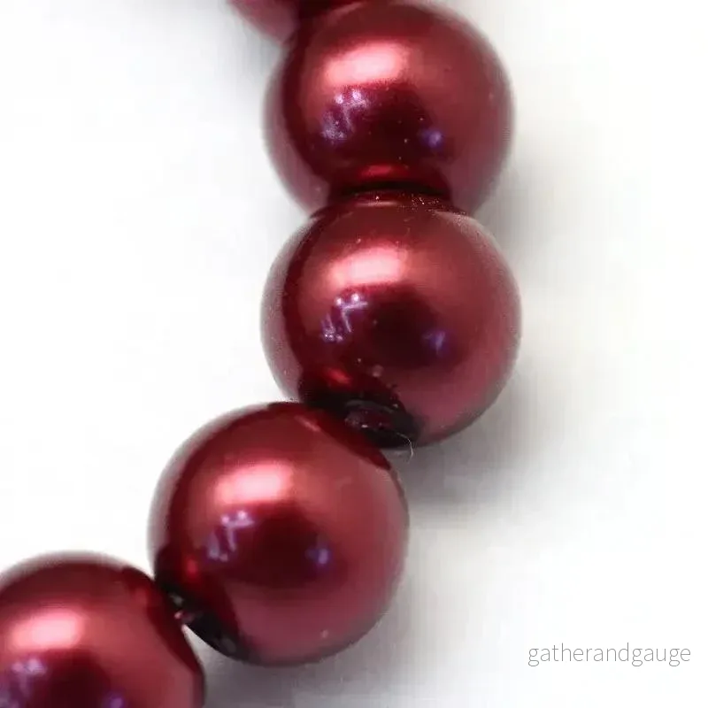 Vaxade glaspärlor - Mörkröd 8mm 1 sträng