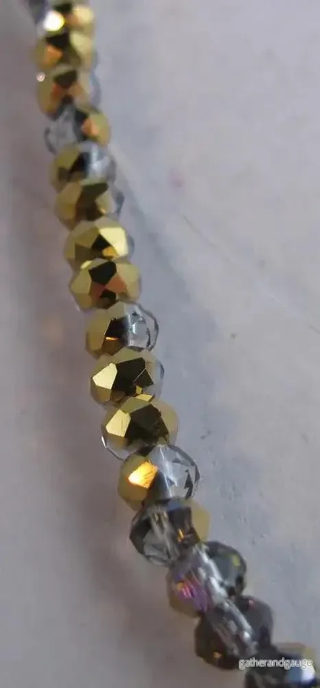 Facetterade glaspärlor – Grå/Rosa/Guld, 3x2mm, 1 sträng