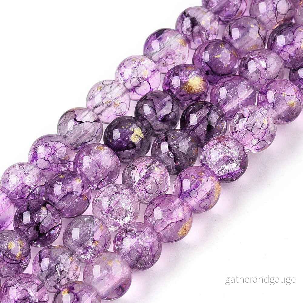 Krackelerad Rund – Stardust Dark Orchid 6mm, 1 sträng Krackelerad Rund – Stardust Dark Orchid 6mm, 1 sträng
