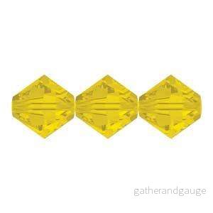 Swarovski crystals Bicone (5328) – Yellow Opal 3mm, 10-pack Swarovski crystals Bicone (5328) – Yellow Opal 3mm, 10-pack