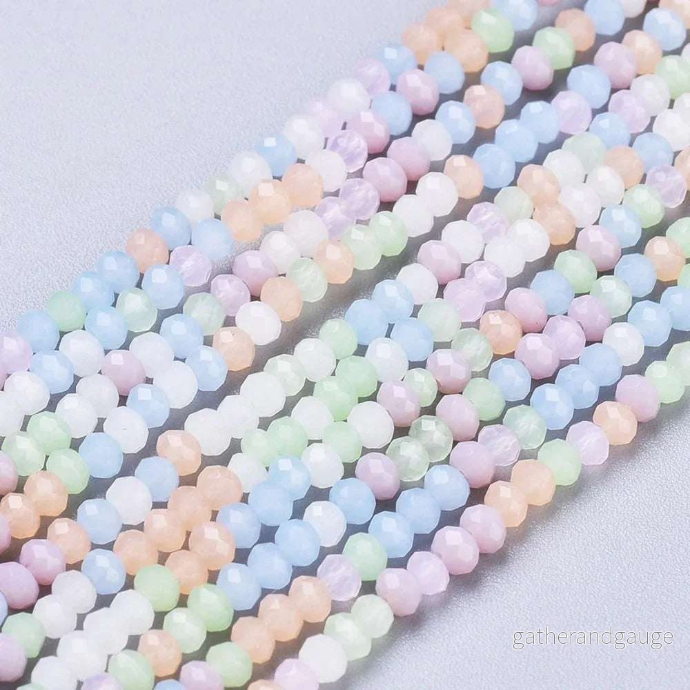 Facetterade glaspärlor - Pastell Mix 3x2,5mm 1 sträng - Bild 2
