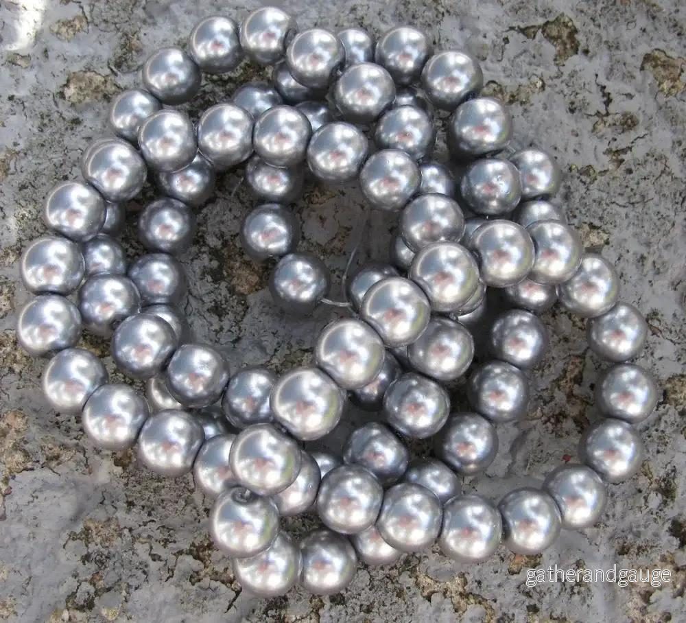 Vaxade glaspärlor - Grå 10 mm, 1 sträng