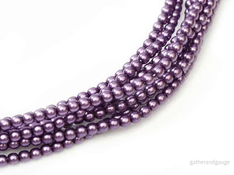 Tjeckiska vaxade glaspärlor - Shiny Violet 2mm, 1 sträng