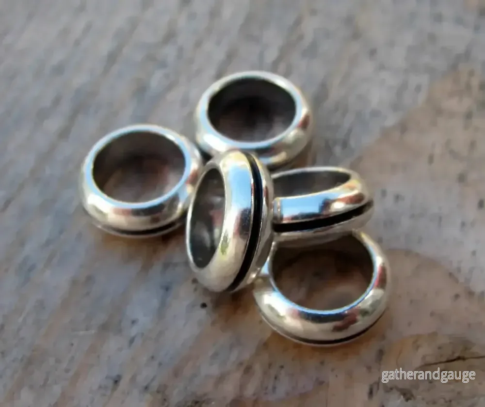 Mellandel Silverfärgad Tunna med Rand – 10×3,7mm, 5-pack Mellandel Silverfärgad Tunna med Rand – 10×3,7mm, 5-pack