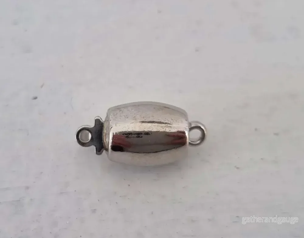 Claspgarten Instickslås - Bullig Oval Rundad Silverfärgad 11x8mm 1 styck