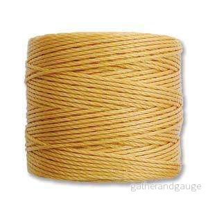 S- Lon bead cord – Marigold, 1 rulle S- Lon bead cord – Marigold, 1 rulle