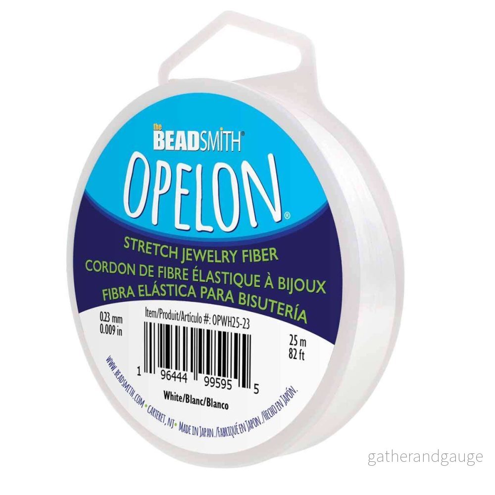 Opelon Elastisk Tråd – Vit 0,23mm, 1 Rulle Opelon Elastisk Tråd – Vit 0,23mm, 1 Rulle