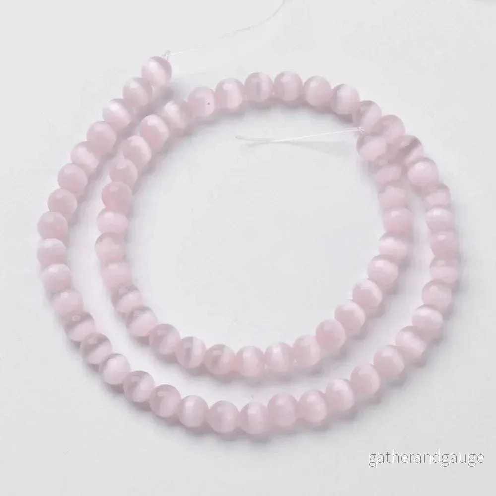 Cat´s eye pärlor – Rund Rosa 8mm, 1 sträng