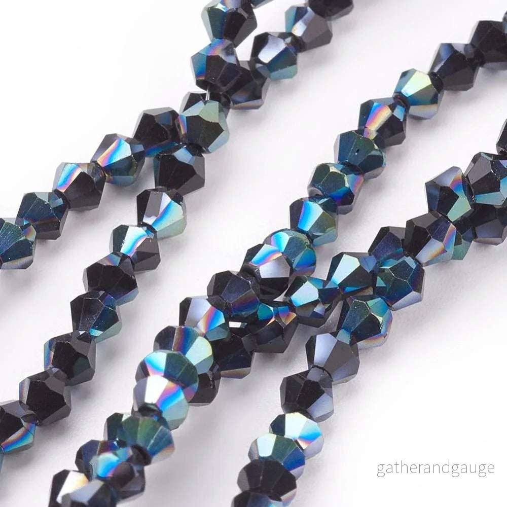 Glaspärlor – Bicone Olja 3 mm Glaspärlor – Bicone Olja 3 mm