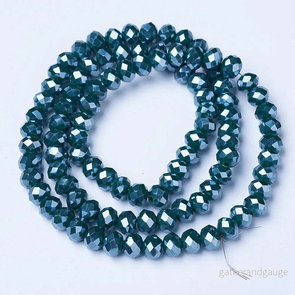 Facetterade glaspärlor – Mörkgrön med pärlemoshimmer 3,5x3mm 1 sträng