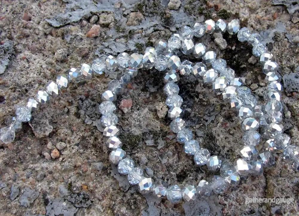 Facetterade glaspärlor - Klar/Silver, 6x4mm 1 sträng
