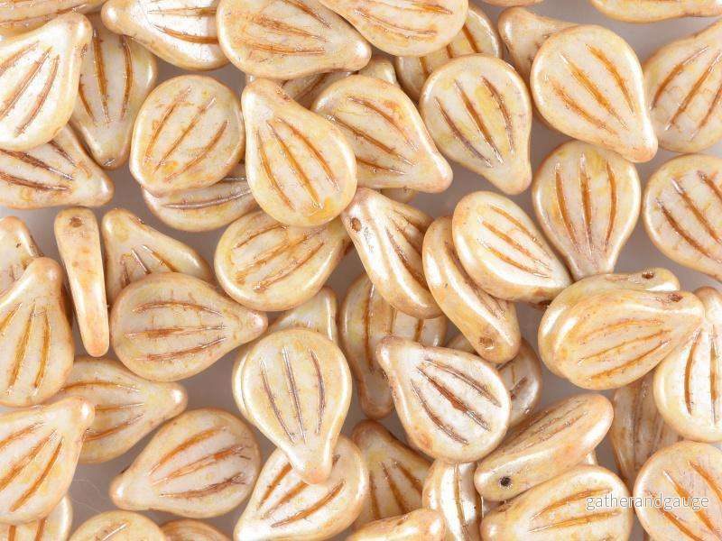 Preciosa Engraved Pip – Alabaster Honey Picasso 9x14mm, 5-pack Preciosa Engraved Pip – Alabaster Honey Picasso 9x14mm, 5-pack