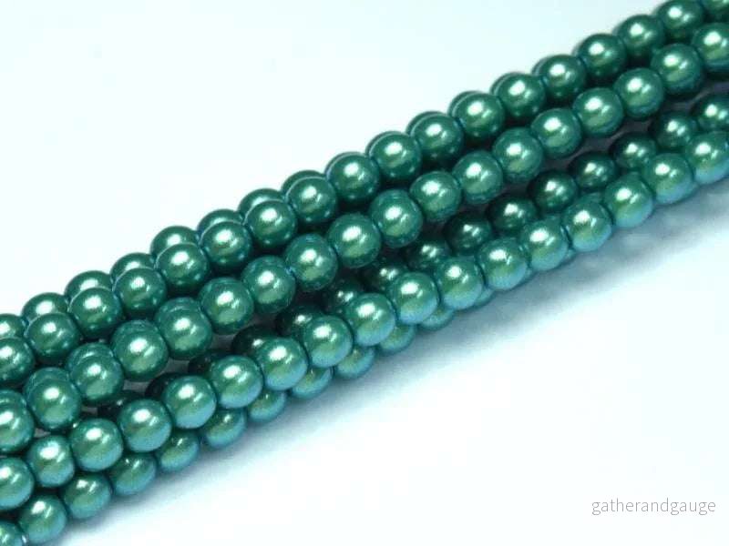 Tjeckiska Pearl Shell - Pepparmint 2mm, 1 sträng