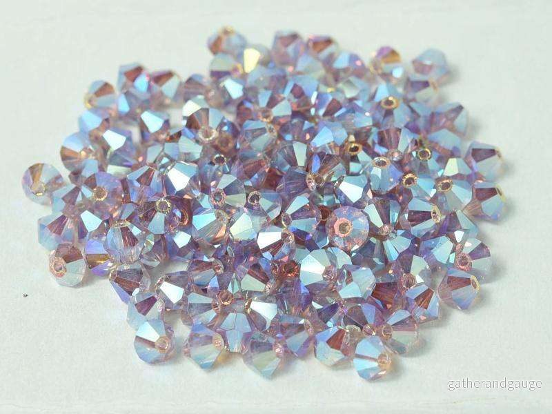 Tjeckiska Bicone - LT Amethyst 2x AB, 4 mm, 30-pack - Bild 2