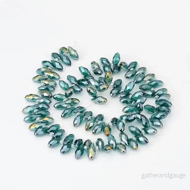 Facetterade droppar - Teal skimmer, 13x6mm, 1 sträng