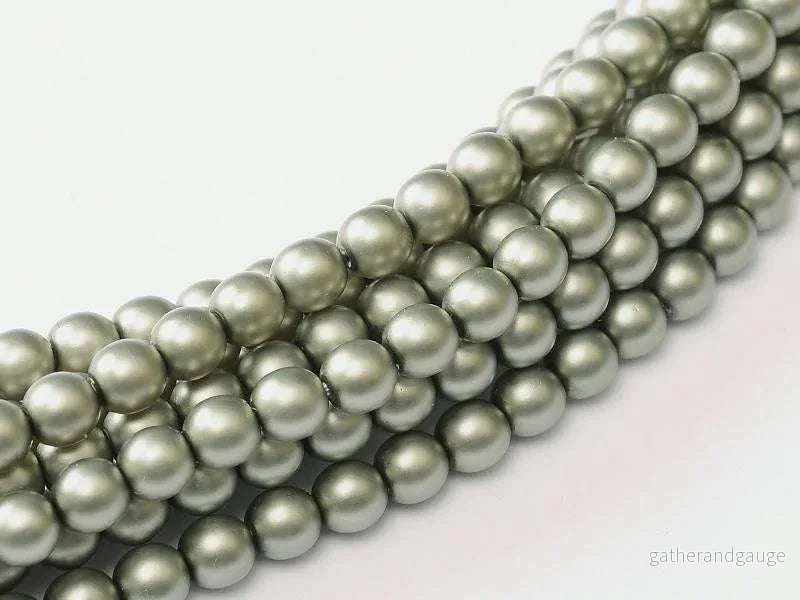 Tjeckiska vaxade glaspärlor - Matted Powder Green 2mm, 1 sträng