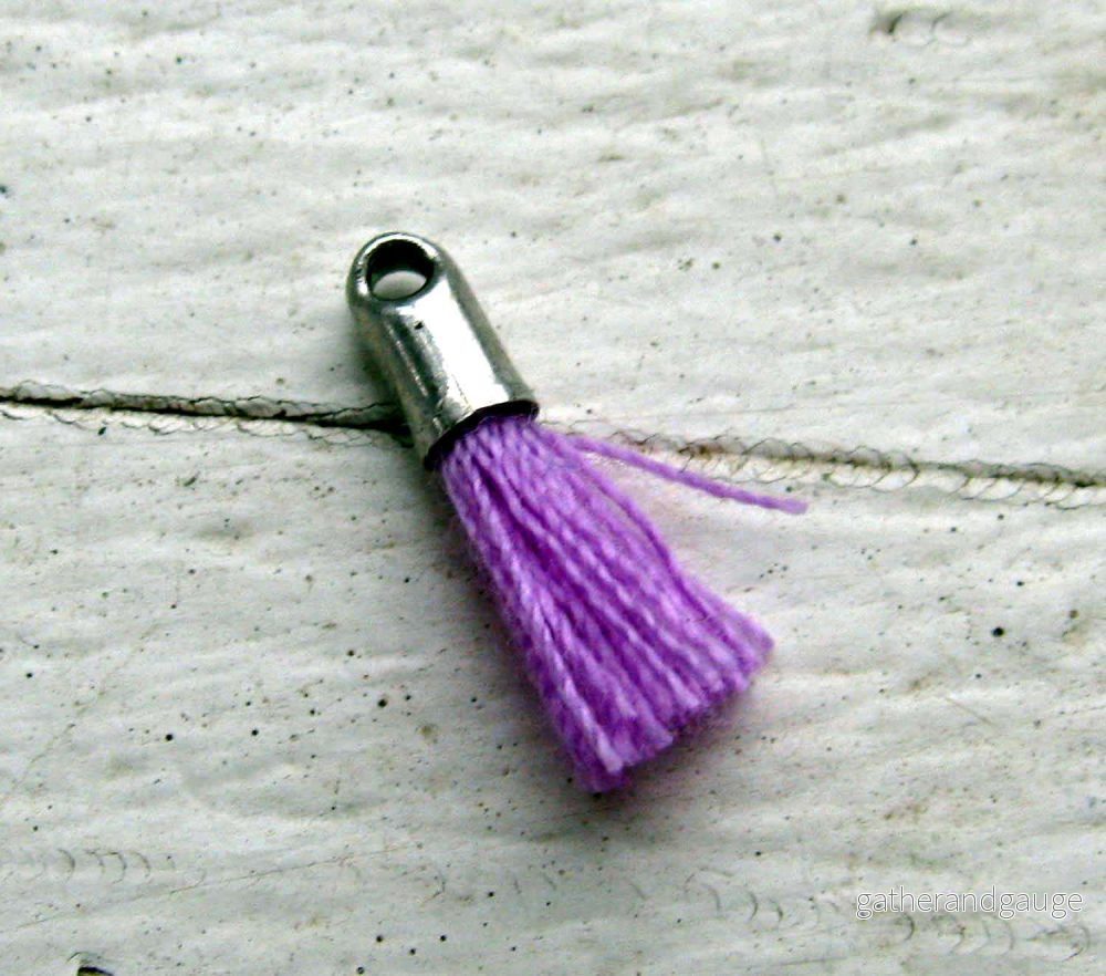 Bomullstofs – Mini Lila / Silver 12mm 1 styck Bomullstofs – Mini Lila / Silver 12mm 1 styck