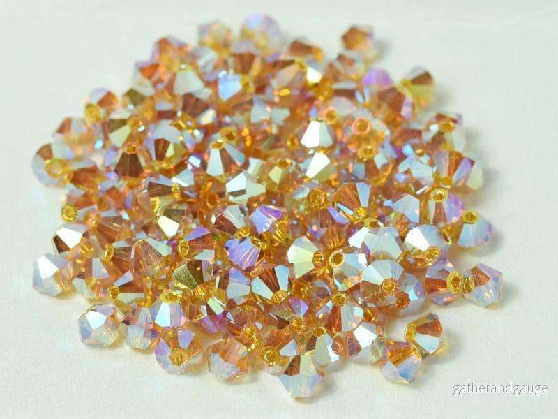 Tjeckiska Bicone - Topaz 2x AB, 4 mm, 30-pack - Bild 2