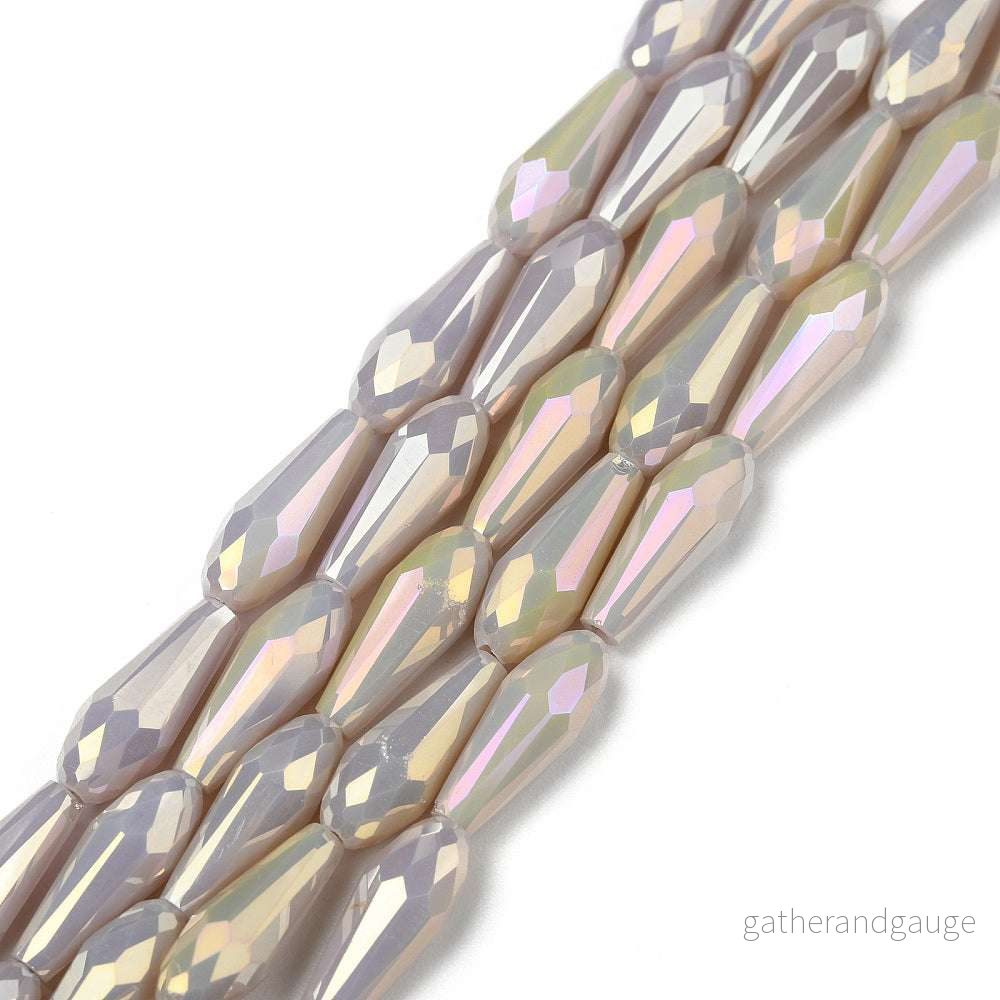 Facetterade droppar – Teardrop Rosybrown Rainbow, 15x6mm, 1 styck