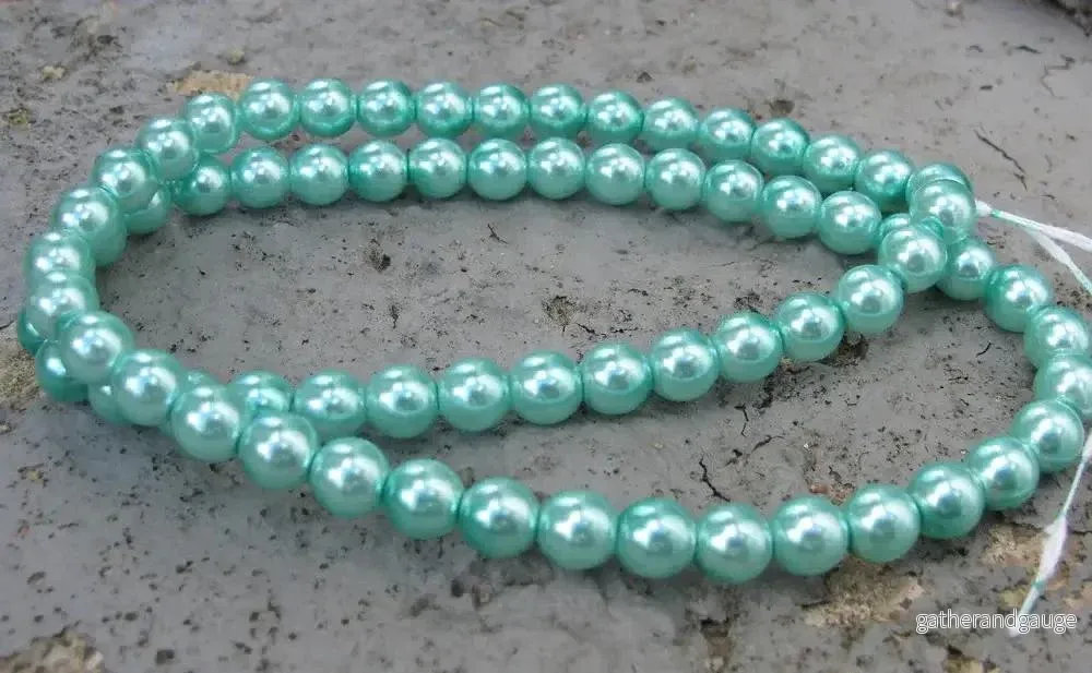 Tjeckiska vaxade glaspärlor – Aqua 6mm, 1 sträng