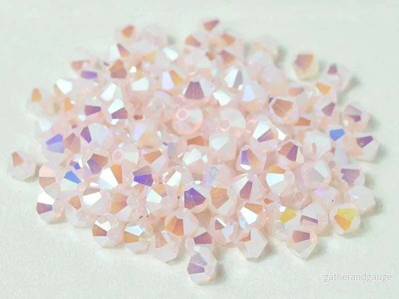 Tjeckiska Bicone - Rose Opal 2x AB, 4 mm, 30-pack - Bild 2