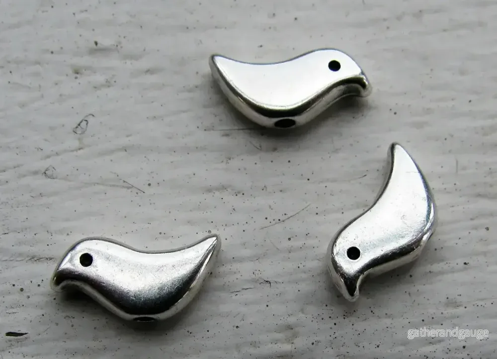 Mellandel silverfärgad – Fågel, 12x6mm, 3-pack