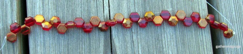 Honeycomb Jewel - Ruby Bronze 6mm, 1 sträng