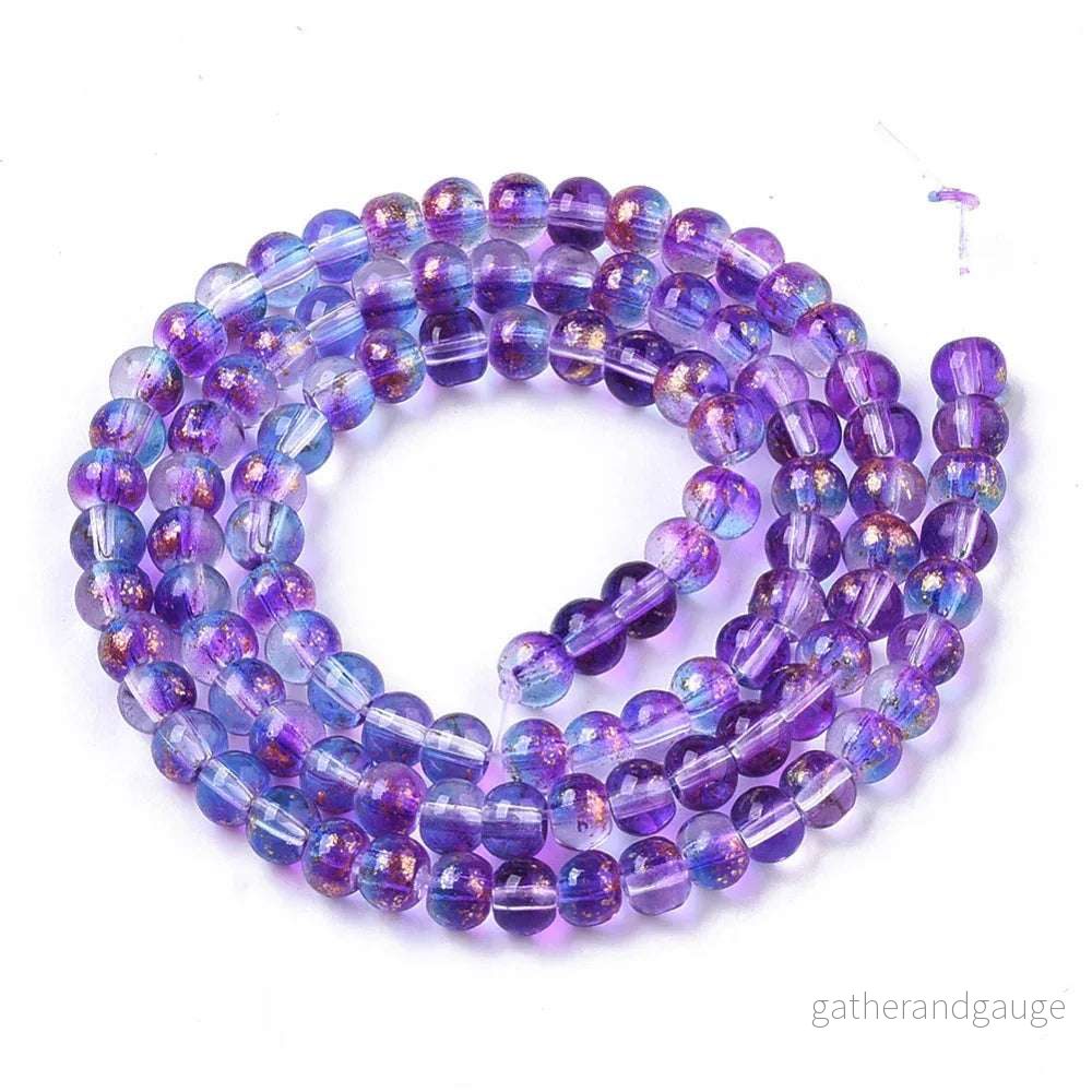 Glaspärlor Rund – Blålila Guldshimmer 4mm 1 sträng