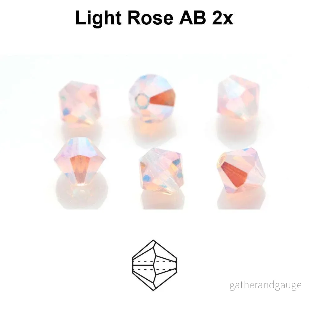 Tjeckiska Bicone LT Rose 2x AB 4 mm 30-pack Tjeckiska Bicone LT Rose 2x AB 4 mm 30-pack