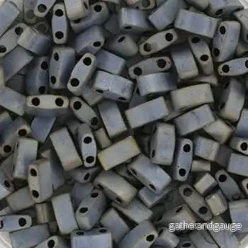 Miyuki Half Tila – Matte Metallic Silver Grey 5×2,5mm 5 gram Miyuki Half Tila – Matte Metallic Silver Grey 5×2,5mm 5 gram