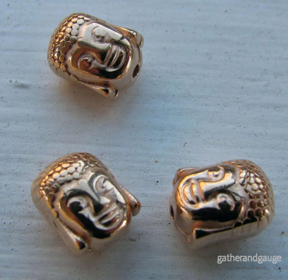Mellandel Roséguldfärgad – Buddha huvud 10x8mm, 3-pack