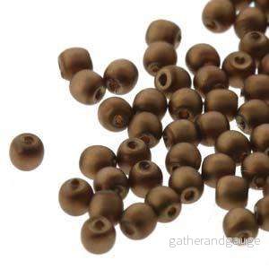 Tjeckiska Vaxade Glaspärlor – Antique Gold Matt 2mm, 1 sträng