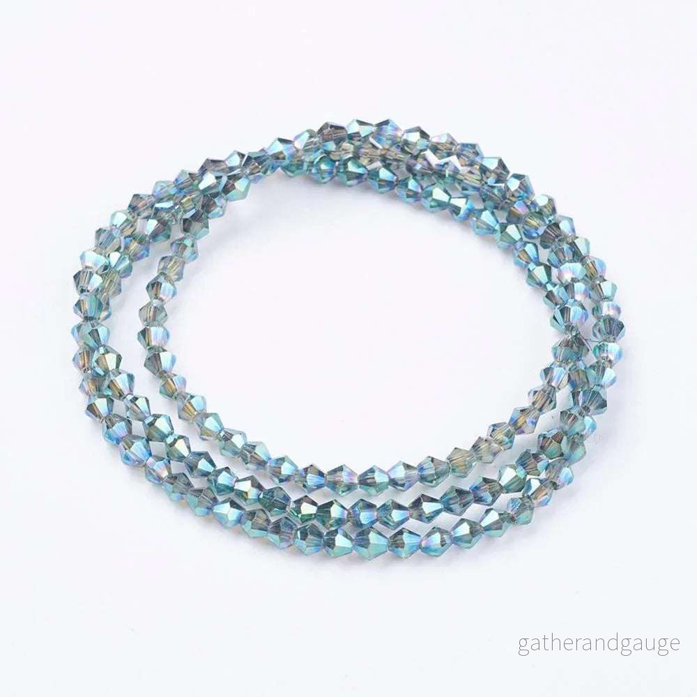 Glaspärlor Bicone - Teal, 3mm, 1 sträng - Bild 2