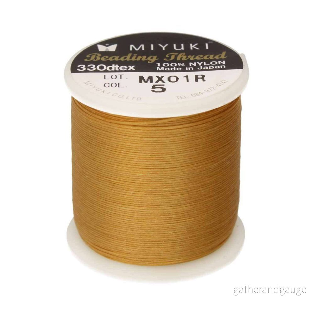Miyuki Beading Thread – Gold, 1 rulle Miyuki Beading Thread – Gold, 1 rulle