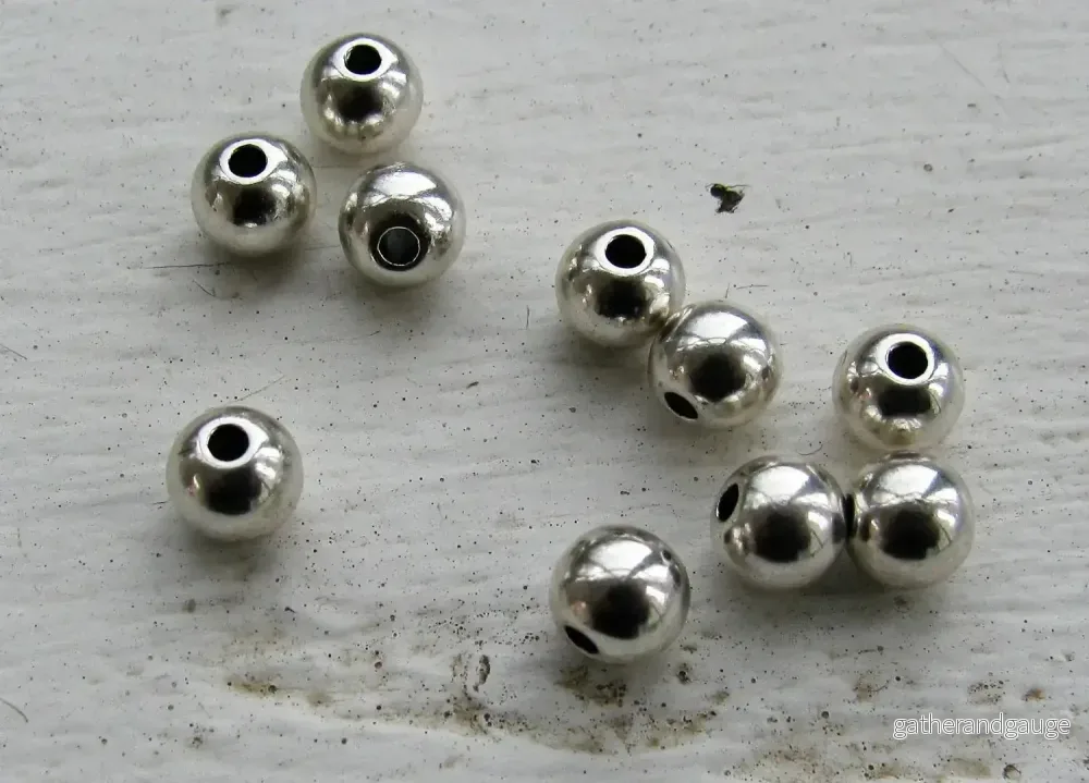 Mellandel Silverfärgad - Rund 6 mm 10-pack
