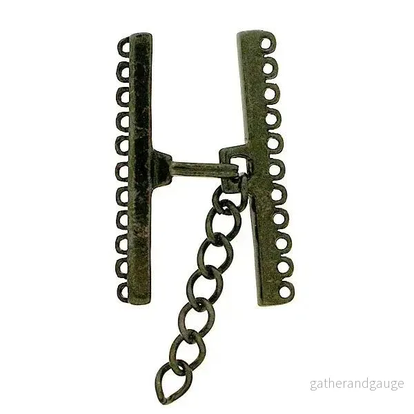 Claspgarten Brett Avslut – Haklås 37mm, Svart, 1 Styck Claspgarten Brett Avslut – Haklås 37mm, Svart, 1 Styck