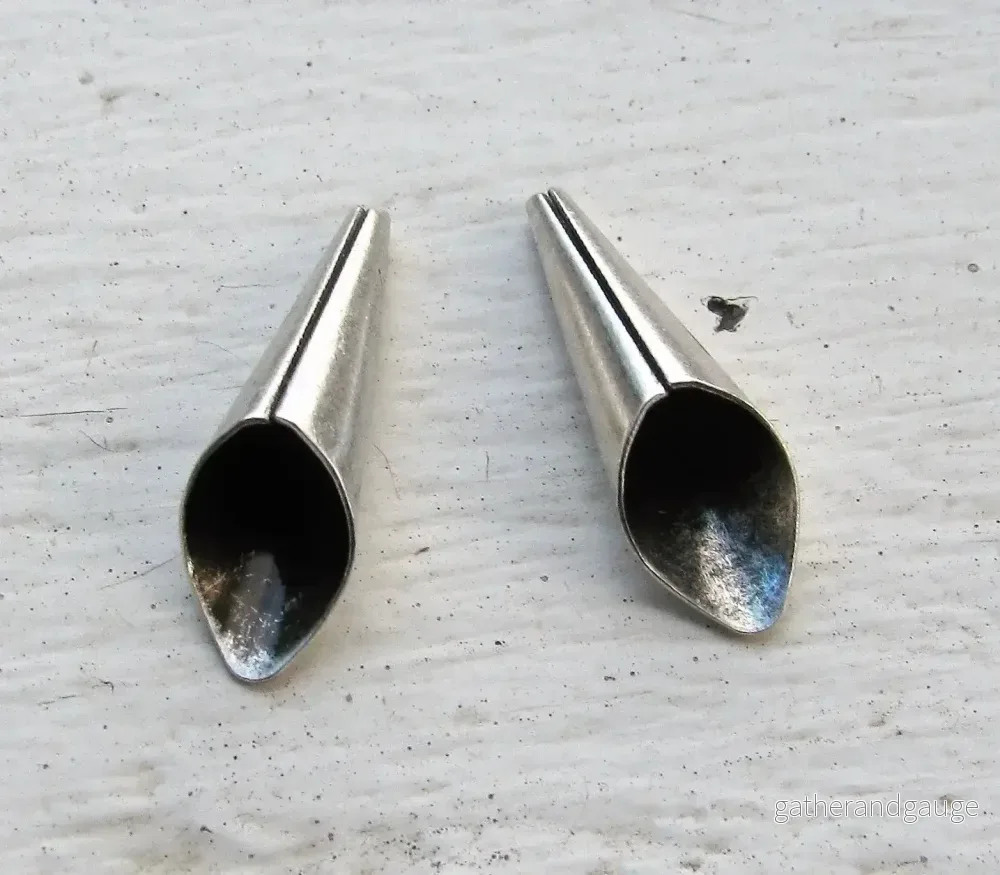 Koner Silverfärgade - Strutar 21x6mm 2-pack