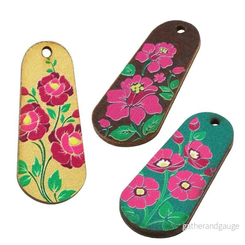 Hänge / Berlock Trä - Oval med blommor, brun 15x36mm 1 styck - Bild 2