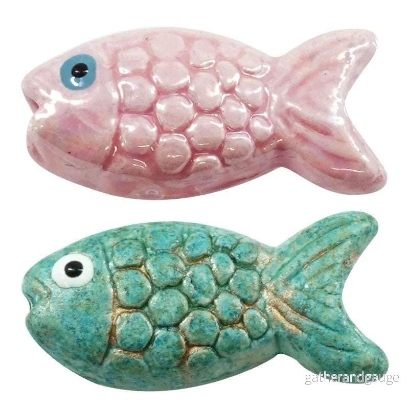 Porslinspärla - Fisk Rosa 26x12mm 1 styck - Bild 2