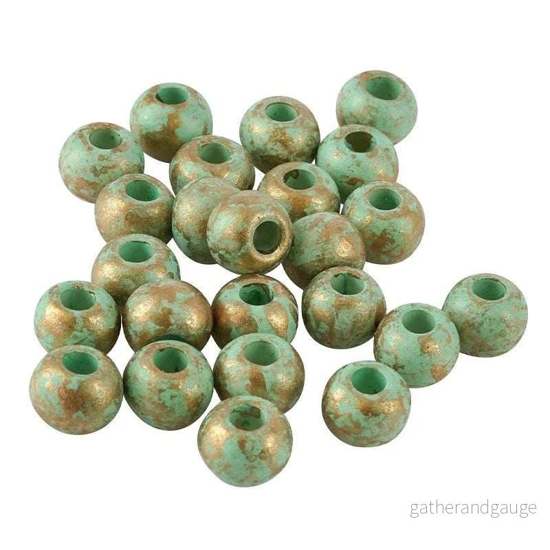 Porslinspärla – Rund Turkos med Guldstänk, 8mm 1 styck