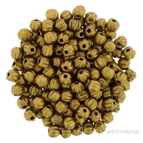 Tjeckiska Melon Round – Matte Metallic Antique Gold 3mm 50-pack