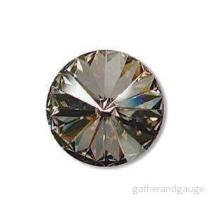 Swarovski Rivoli Crystals – Crystal Silver Shade Foiled 12mm, 1 styck Swarovski Rivoli Crystals – Crystal Silver Shade Foiled 12mm, 1 styck