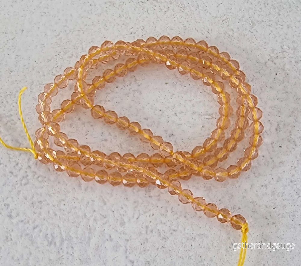Glaspärlor Facetterade – Runda Champagne 3mm 1 sträng
