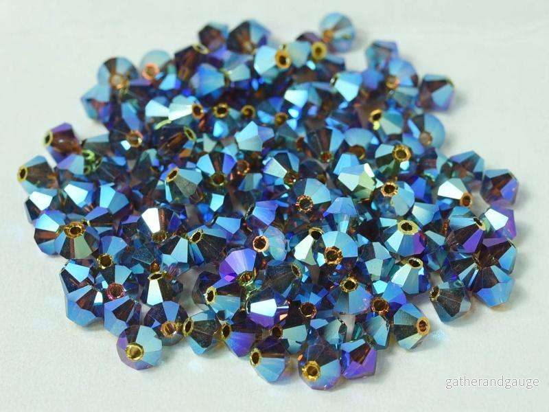 Tjeckiska Bicone - Smoked Topaz 2x AB, 4 mm, 30-pack - Bild 2