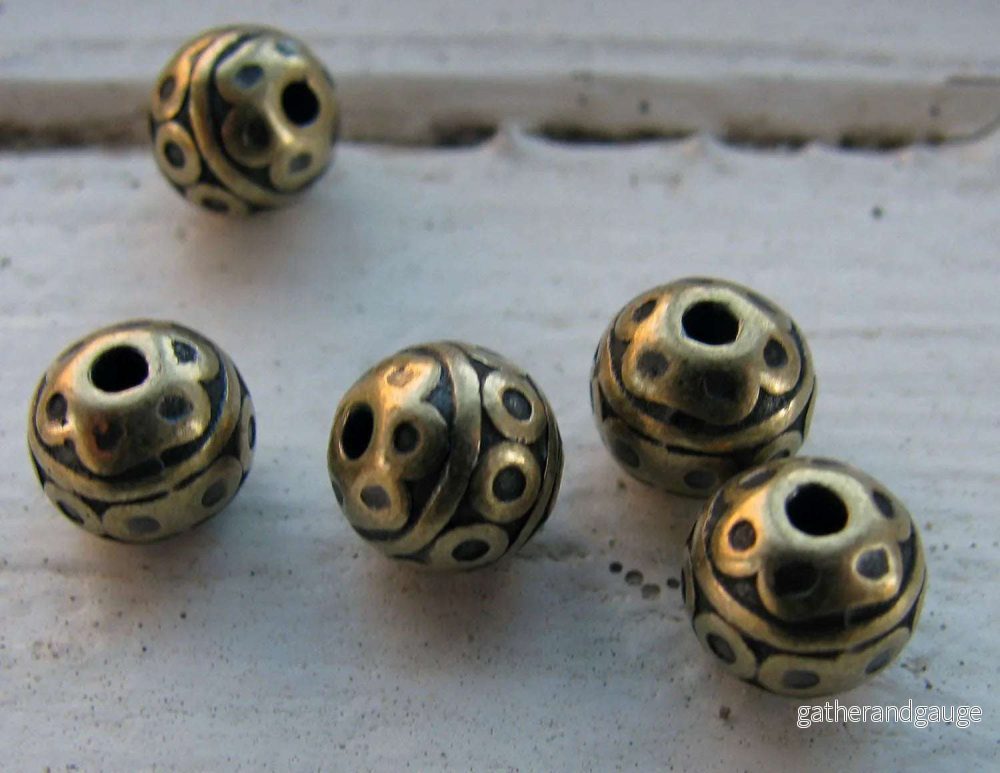 Mellandel bronsfärgad - Rund med cirklar 7mm 5-pack - Bild 2