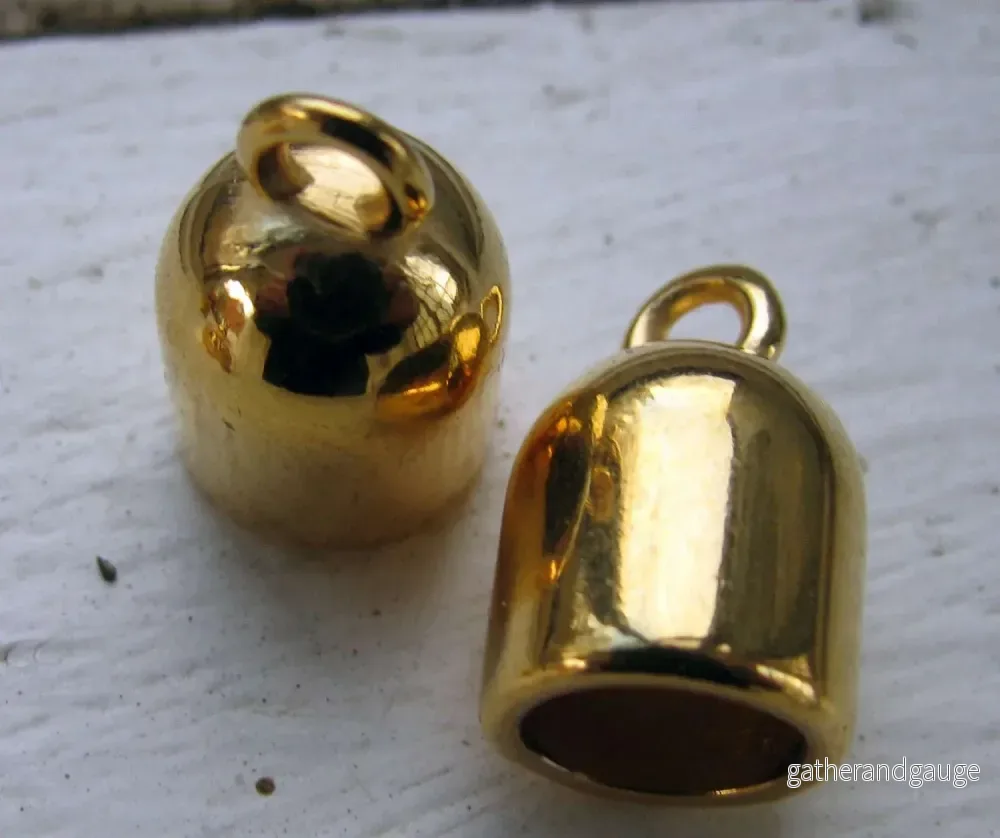 Ändfäste 24k guldpläterad – Rundade med ögla, 8,2mm, 2-pack